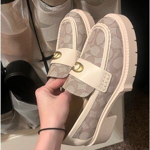 Womans size 6 cream Coach loafers (fits 5 1/2 as well)